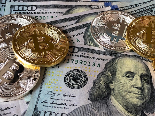 Bitcoin and Dollar Bills